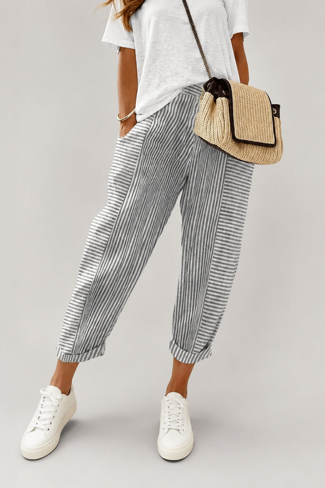 Women's linen pants with stripes and a trendy, close-fitting ankle cut