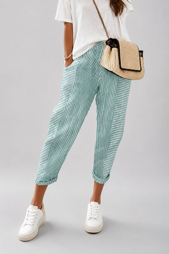 Women's linen pants with stripes and a trendy, close-fitting ankle cut
