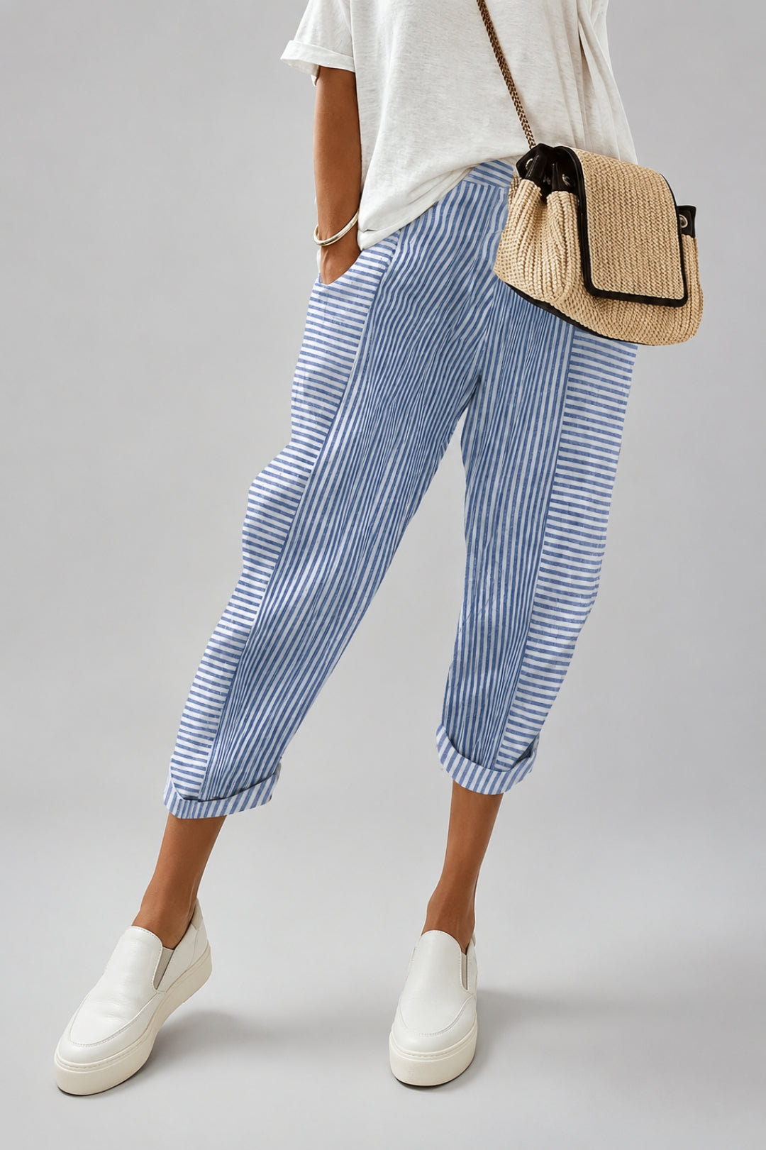 Women's linen pants with stripes and a trendy, close-fitting ankle cut